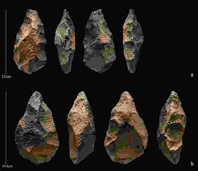 A Depiction Of Early Humans Using Stone Tools, Highlighting The Technological Advancements That Have Shaped Human History. Technology In World Civilization Revised And Expanded Edition: A Thousand Year History