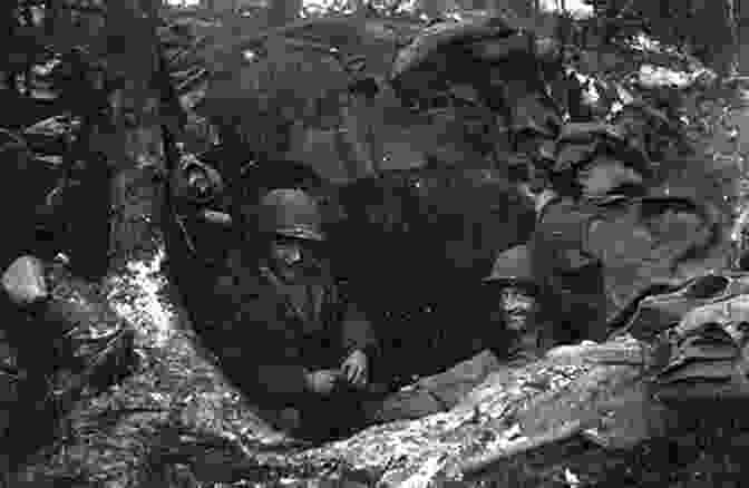 A Group Of Soldiers Huddled Together In A Foxhole During The Battle Of The Bulge The Somme: The Epic Battle In The Soldiers Own Words And Photographs